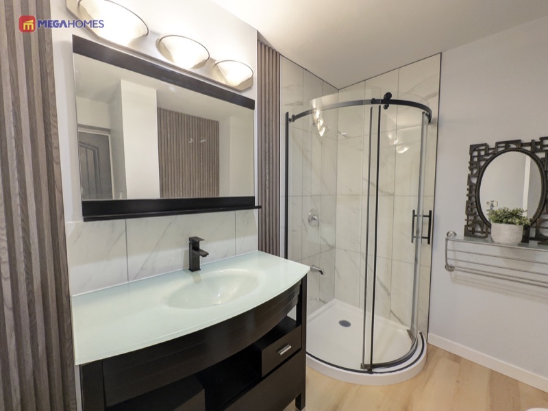 Newly remodelled main floor three piece bathroom with walk-in shower