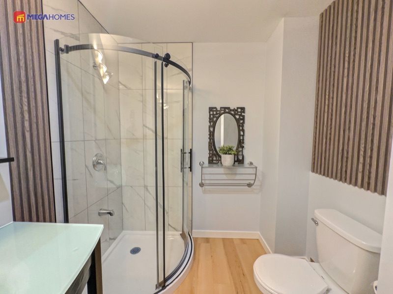 Main floor three piece bathroom vanity and fixtures