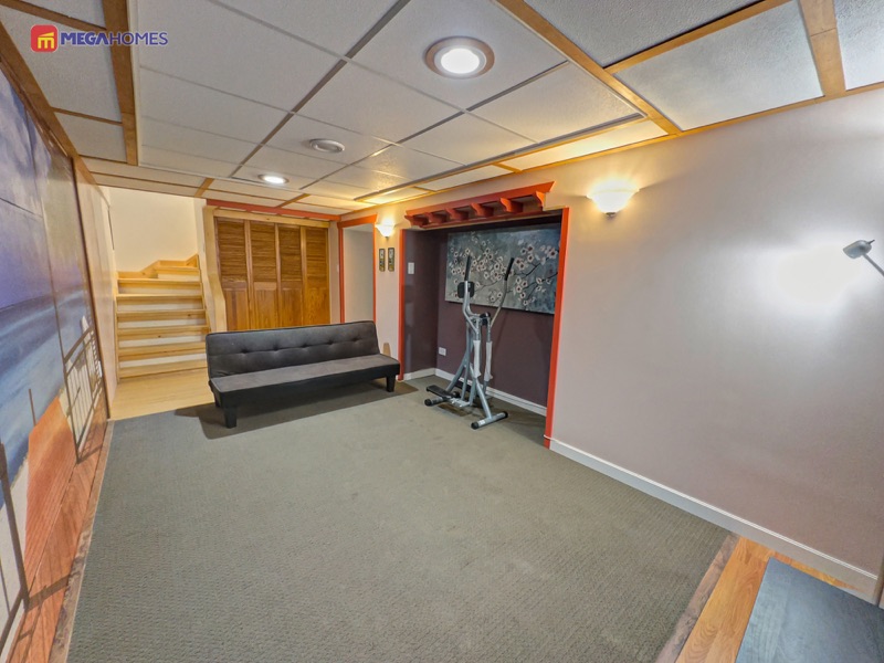 Basement rec room looking back toward the stairs
